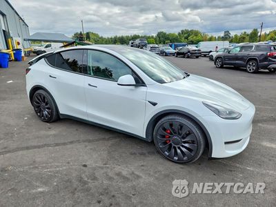 Czwarte zdjęcie samochodu z boku: 2023 TESLA MODEL Y VIN:7SAYGDEF7PF778085 - miniatura