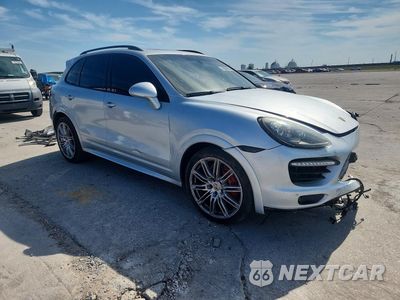 Czwarte zdjęcie samochodu z boku: 2013 PORSCHE CAYENNE GTS VIN:WP1AD2A23DLA79333 - miniatura