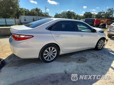 Trzecie zdjęcie samochodu z tyłu: 2016 TOYOTA CAMRY HYBRID XLE VIN:4T1BD1FK5GU179808 - miniatura