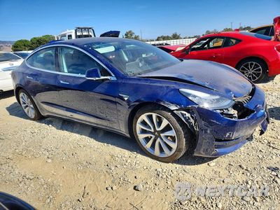 Czwarte zdjęcie samochodu z boku: 2019 TESLA MODEL 3 VIN:5YJ3E1EBXKF497478 - miniatura