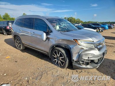Czwarte zdjęcie samochodu z boku: 2019 HONDA PILOT TOURING VIN:5FNYF5H92KB029246 - miniatura