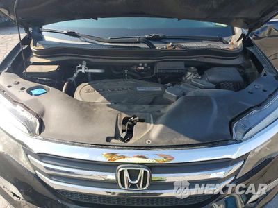 Zdjęcie 12 z 13 samochodu: 2017 HONDA PILOT EXL VIN:5FNYF5H59HB025930 - miniatura