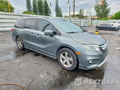 Czwarte zdjęcie samochodu z boku: 2018 HONDA ODYSSEY EXL VIN:5FNRL6H70JB076808 - miniatura