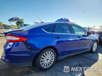 Trzecie zdjęcie samochodu z tyłu: 2015 FORD FUSION S HYBRID VIN:3FA6P0UU9FR116492 - miniatura