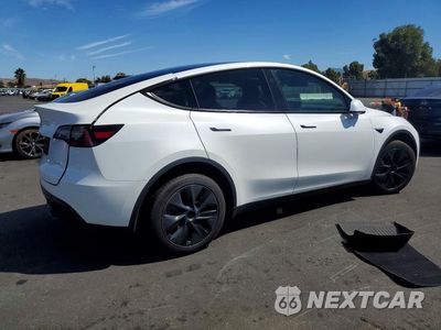 Trzecie zdjęcie samochodu z tyłu: 2024 TESLA MODEL Y VIN:7SAYGDEE4RF123280 - miniatura