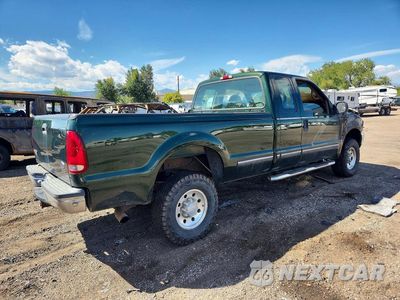 Trzecie zdjęcie samochodu z tyłu: 1999 FORD F250 SUPER DUTY VIN:1FTNX21F3XEB32196 - miniatura
