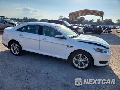 Czwarte zdjęcie samochodu z boku: 2016 FORD TAURUS SEL VIN:1FAHP2E8XGG124437 - miniatura