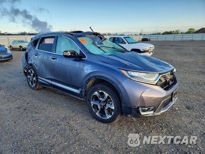 Czwarte zdjęcie samochodu z boku: 2018 HONDA CR-V TOURING VIN:7FARW2H98JE060989 - miniatura