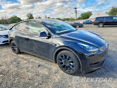 Czwarte zdjęcie samochodu z boku: 2023 TESLA MODEL Y VIN:7SAYGDEE7PF760225 - miniatura