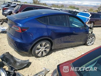 Trzecie zdjęcie samochodu z tyłu: 2022 TESLA MODEL Y VIN:7SAYGAEE3NF493127 - miniatura