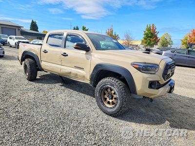 Czwarte zdjęcie samochodu z boku: 2018 TOYOTA TACOMA TRD SPORT VIN:5TFCZ5AN6JX164775 - miniatura