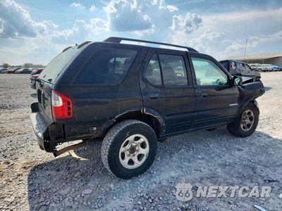 Trzecie zdjęcie samochodu z tyłu: 2003 ISUZU RODEO S VIN:4S2CK58WX34308808 - miniatura