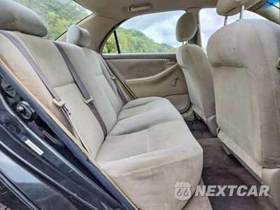 Zdjęcie 10 z 12 samochodu: 2004 TOYOTA COROLLA CE VIN:JTDBR32E042024205 - miniatura