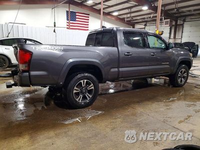 Trzecie zdjęcie samochodu z tyłu: 2016 TOYOTA TACOMA TRD SPORT VIN:5TFDZ5BN7GX012189 - miniatura