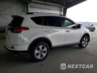Trzecie zdjęcie samochodu z tyłu: 2018 TOYOTA RAV4 XLE VIN:JTMWFREV6JJ211118 - miniatura