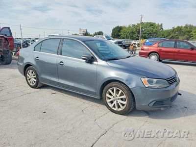 Czwarte zdjęcie samochodu z boku: 2013 VOLKSWAGEN JETTA SE VIN:3VWDP7AJ2DM402888 - miniatura