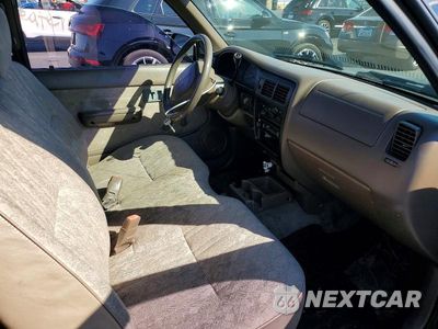 Zdjęcie 7 z 12 samochodu: 2000 TOYOTA TACOMA BASE VIN:4TANL42N6YZ672936 - miniatura
