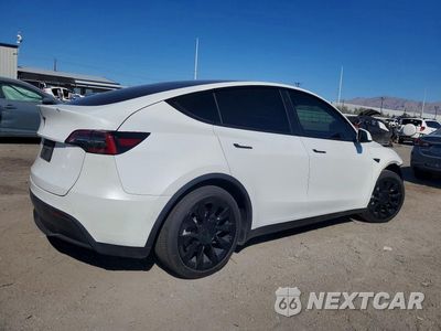 Trzecie zdjęcie samochodu z tyłu: 2022 TESLA MODEL Y VIN:7SAYGDEE1NF437737 - miniatura