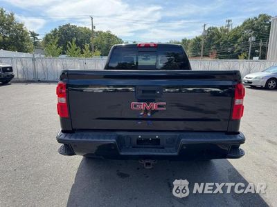 Piąte zdjęcie samochodu w środku: 2017 GMC SIERRA K1500 SLE VIN:3GTU2MEC9HG476566 - miniatura