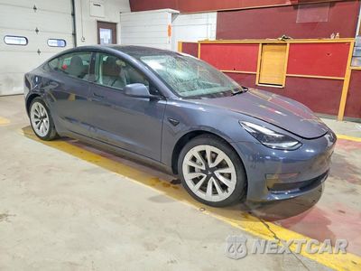 Czwarte zdjęcie samochodu z boku: 2022 TESLA MODEL 3 VIN:5YJ3E1EB5NF127382 - miniatura