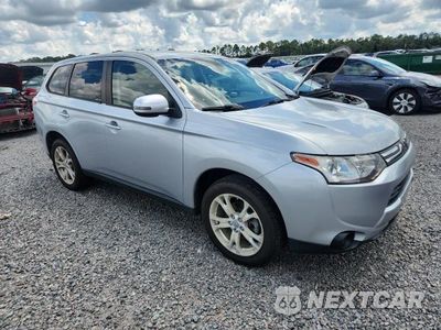 Czwarte zdjęcie samochodu z boku: 2014 MITSUBISHI OUTLANDER SE VIN:JA4AD3A35EZ017442 - miniatura