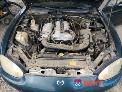 Zdjęcie 11 z 12 samochodu: 2000 MAZDA MX-5 MIATA BASE VIN:JM1NB3533Y0140186 - miniatura