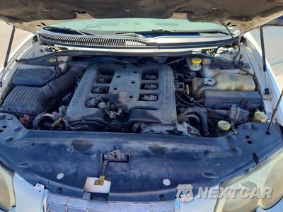 Zdjęcie 11 z 12 samochodu: 1999 CHRYSLER 300M VIN:2C3HE66G2XH651331 - miniatura