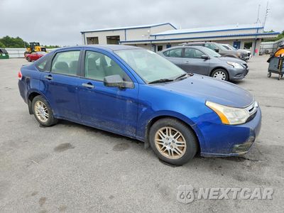 Czwarte zdjęcie samochodu z boku: 2009 FORD FOCUS SE VIN:1FAHP35NX9W270017 - miniatura