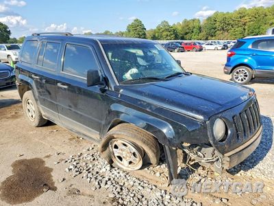 Czwarte zdjęcie samochodu z boku: 2014 JEEP PATRIOT SPORT VIN:1C4NJPBB4ED853382 - miniatura