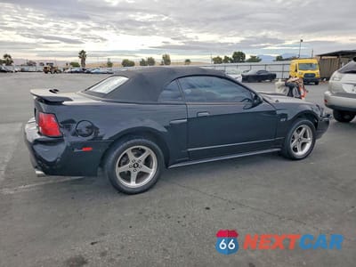 Trzecie zdjęcie samochodu z tyłu: 2003 FORD MUSTANG GT VIN:1FAFP45X93F352715 - miniatura