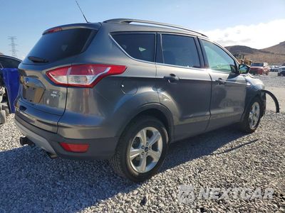 Trzecie zdjęcie samochodu z tyłu: 2014 FORD ESCAPE SE VIN:1FMCU9G91EUE12675 - miniatura