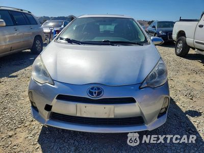 Piąte zdjęcie samochodu w środku: 2014 TOYOTA PRIUS C FOUR VIN:JTDKDTB3XE1059838 - miniatura