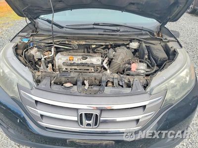 Zdjęcie 12 z 13 samochodu: 2014 HONDA CR-V EXL VIN:2HKRM4H74EH709612 - miniatura