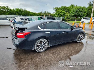 Trzecie zdjęcie samochodu z tyłu: 2016 NISSAN ALTIMA 3.5 SR VIN:1N4BL3AP6GC224191 - miniatura