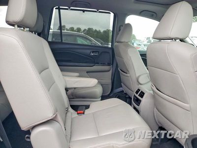 Zdjęcie 11 z 13 samochodu: 2020 HONDA PILOT TOURING VIN:5FNYF5H65LB006034 - miniatura