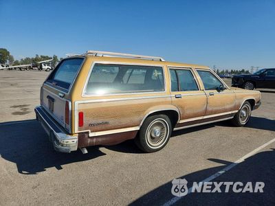 Trzecie zdjęcie samochodu z tyłu: 1991 FORD CROWN VICTORIA COUNTRY SQUIRE LX VIN:2FACP79FXMX149215 - miniatura