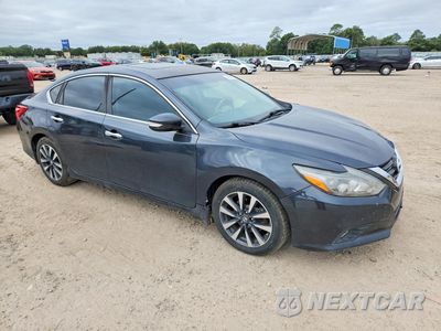 Czwarte zdjęcie samochodu z boku: 2016 NISSAN ALTIMA 2.5 SL VIN:1N4AL3AP6GC110008 - miniatura
