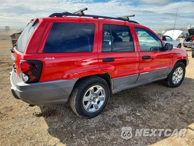 Trzecie zdjęcie samochodu z tyłu: 1999 JEEP GRAND CHEROKEE LAREDO VIN:1J4GW58S7XC752961 - miniatura