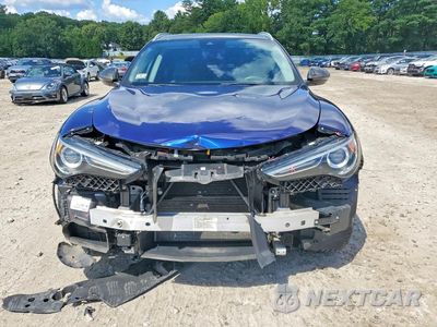 Piąte zdjęcie samochodu w środku: 2019 ALFA ROMEO STELVIO TI VIN:ZASPAKBN7K7C33438 - miniatura