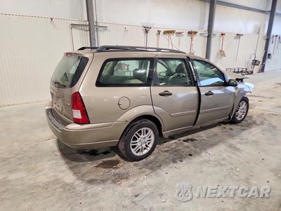 Trzecie zdjęcie samochodu z tyłu: 2005 FORD FOCUS ZXW VIN:1FAFP36NX5W221738 - miniatura