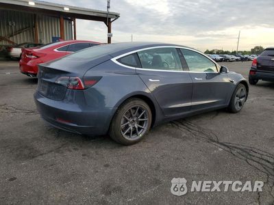 Trzecie zdjęcie samochodu z tyłu: 2018 TESLA MODEL 3 VIN:5YJ3E1EBXJF114427 - miniatura