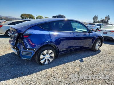 Trzecie zdjęcie samochodu z tyłu: 2023 TESLA MODEL Y VIN:7SAYGDEE2PA031322 - miniatura