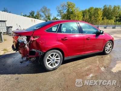 Trzecie zdjęcie samochodu z tyłu: 2016 FORD FOCUS SE VIN:1FADP3F28GL358761 - miniatura