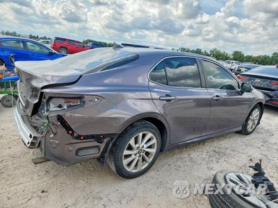Trzecie zdjęcie samochodu z tyłu: 2022 TOYOTA CAMRY LE VIN:4T1C11AK0NU666920 - miniatura