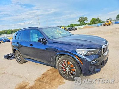 Czwarte zdjęcie samochodu z boku: 2021 BMW X5 XDRIVE40I VIN:5UXCR6C05M9F38603 - miniatura