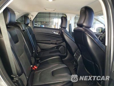 Zdjęcie 11 z 13 samochodu: 2022 FORD EDGE TITANIUM VIN:2FMPK4K99NBA53437 - miniatura