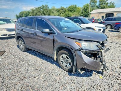 Czwarte zdjęcie samochodu z boku: 2014 HONDA CR-V LX VIN:5J6RM4H34EL072014 - miniatura