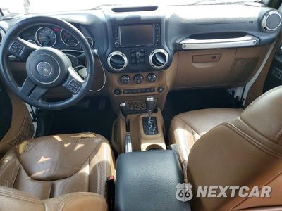 Zdjęcie 8 z 12 samochodu: 2015 JEEP WRANGLER UNLIMITED SAHARA VIN:1C4HJWEG8FL655250 - miniatura