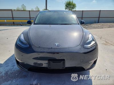 Piąte zdjęcie samochodu w środku: 2025 TESLA MODEL Y VIN:7SAYGAEE2SF247830 - miniatura