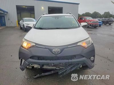 Czwarte zdjęcie samochodu z boku: 2017 TOYOTA RAV4 XLE VIN:JTMRFREV7HJ709223 - miniatura